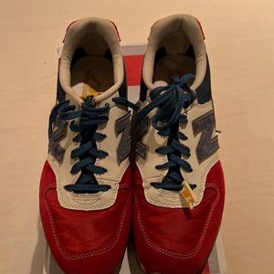 New Balance sneakers. Minor wear on back heel.